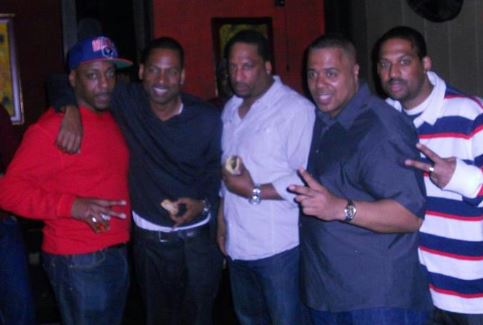Andre Rock is in the middle (white shirt) with his siblings
